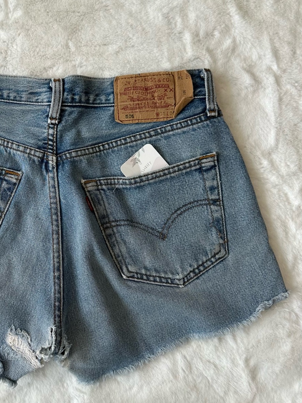 Vintage • Levi's 501 Light Blue Denim Cutoff Shorts with Raw Hem